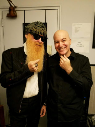 Billy Gibbons crushes Eric Holland in a beard competition.