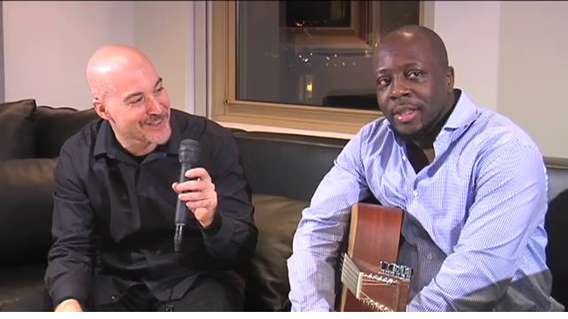 Eric Holland with Wyclef Jean